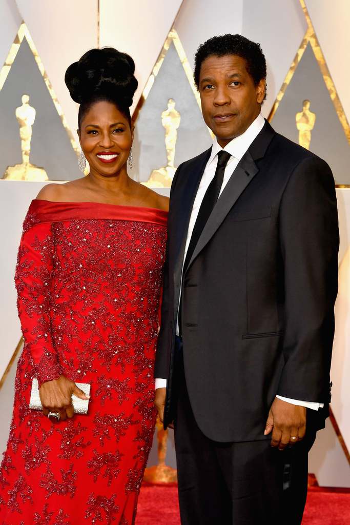 This image has an empty alt attribute; its file name is Denzel-and-Pauletta-Washington.jpg